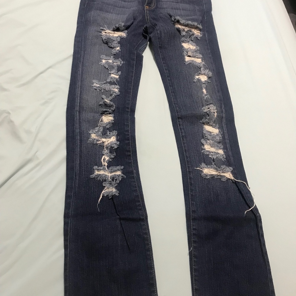 Ripped Blue Jeans from Hot Topic